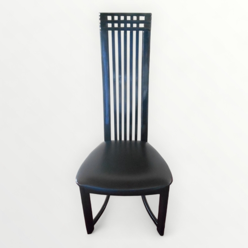 289 - A set of four ebonised high back, pad seat single chairs in the style of Charles Rennie Mackintosh. ... 