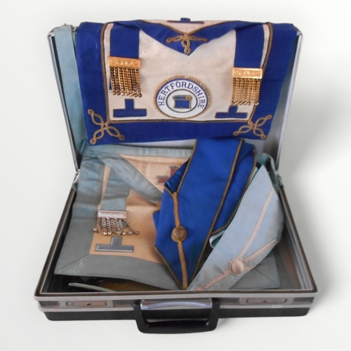 298 - Two hard shell suitcases containing Masonic regalia, medals and literature for the main Hertfordshir... 