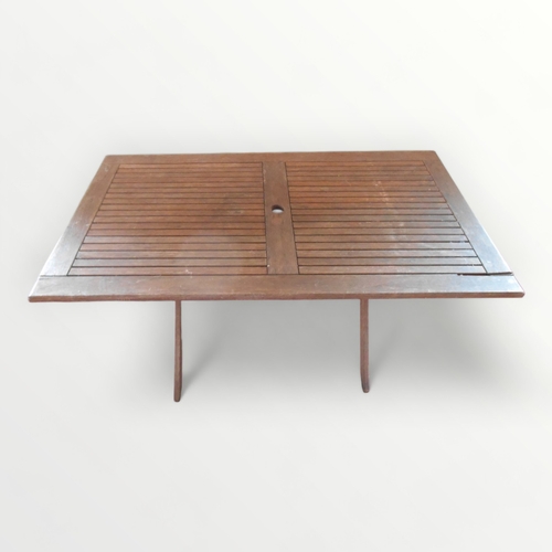 308 - A slatted teak rectangular folding garden table, 74 x 150 x 86cm.