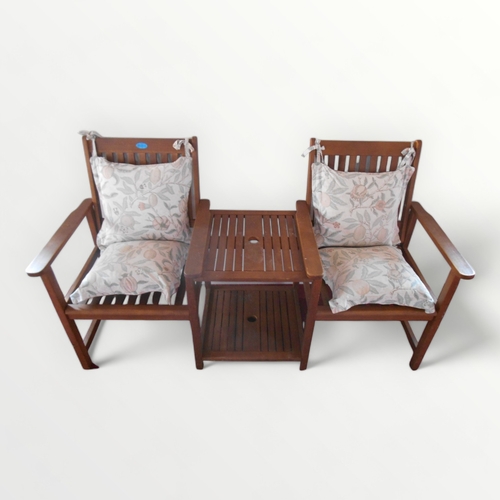 313 - A 'Royalcraft' slatted teak garden love seat having central two tier table with provision for a brol... 