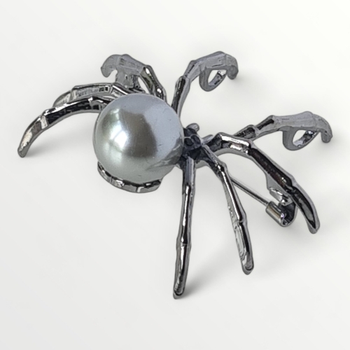 11 - A large gunmetal spider brooch, approx 4cm. Shipping group (A)