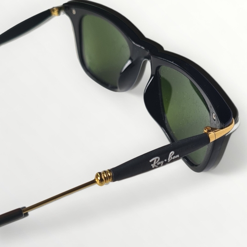 14 - Pair of Ray-Ban RB2148 sunglasses. Shipping group (A).