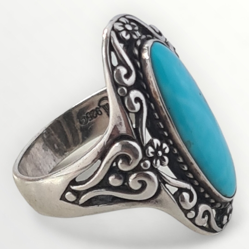 38 - Silver and large turquoise set ring. Size S. Shipping group (A).