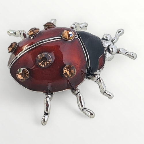 59 - A large and nicely detailed white metal, enamel and stone set Ladybird brooch. Approx 3½ cm. Shippin... 