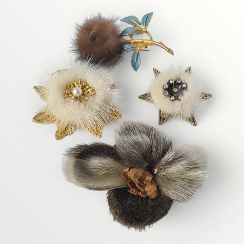 61 - Four vintage handmade Scottish brooches, including real North American Mink. Shipping group (A).