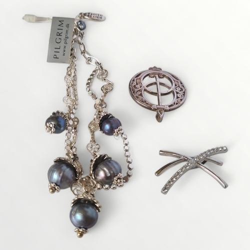 62 - Pilgrim bracelet with tags together with a silver brooch and silver pendant. Shipping group (A).