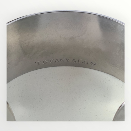 70 - Tiffany & Co., sterling silver cuff bracelet weighing 54.6g. Shipping group (A).