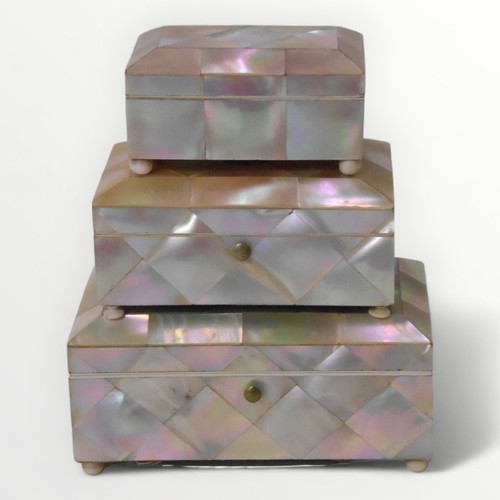 77 - A trio of 19th century mother-of-pearl covered jewellery/trinket boxes, 5 x 11 x 6cm largest. Shippi... 