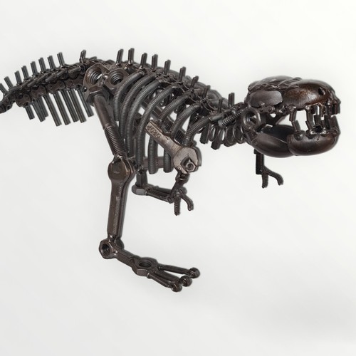 237 - A well constructed scratch-built model dinosaur, fashioned from nuts, bolts and other hardware. 36cm... 