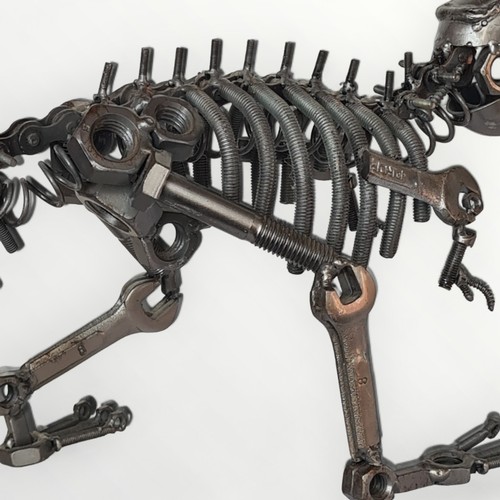 237 - A well constructed scratch-built model dinosaur, fashioned from nuts, bolts and other hardware. 36cm... 