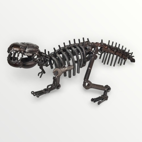 237 - A well constructed scratch-built model dinosaur, fashioned from nuts, bolts and other hardware. 36cm... 