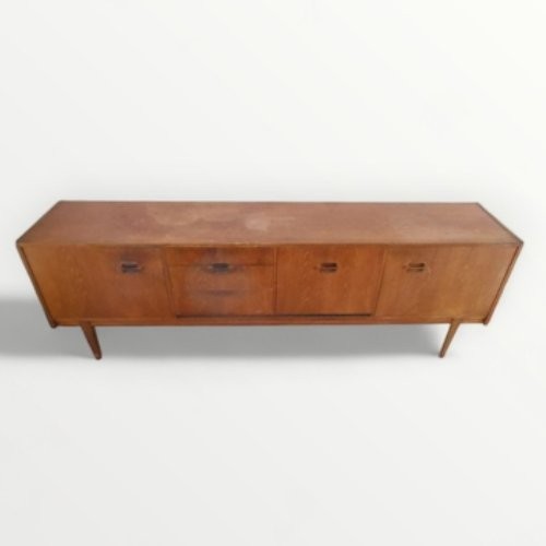 265 - 'Nathan' retro teak 'long and low' sideboard standing on four plain tapering legs. 76 x 214 x 45cm.