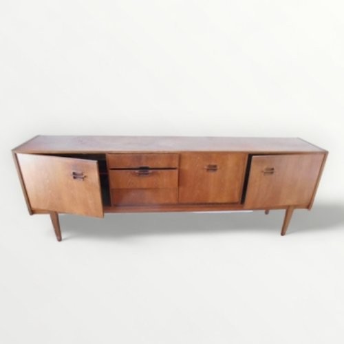 265 - 'Nathan' retro teak 'long and low' sideboard standing on four plain tapering legs. 76 x 214 x 45cm.