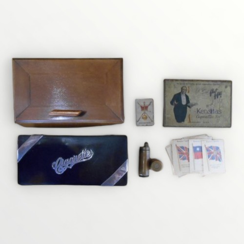 303 - A good selection of 20th century smoking accessories to include two cigarette boxes ( one silver mou... 