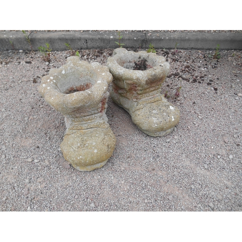 329 - A pair of cast concrete garden boots.