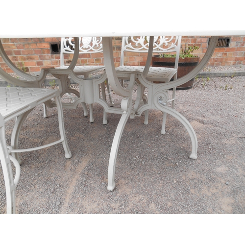 337 - Good quality painted cast metal garden suite - a large pierced table and six chairs.