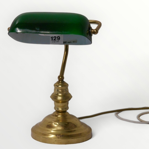 129 - Brass based traditional bankers lamp 37cm high.