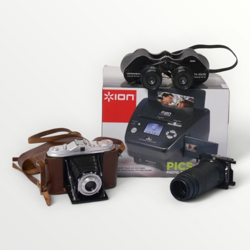 138 - Useable and collectable optical equipment to include a digital photo converter, boxed.