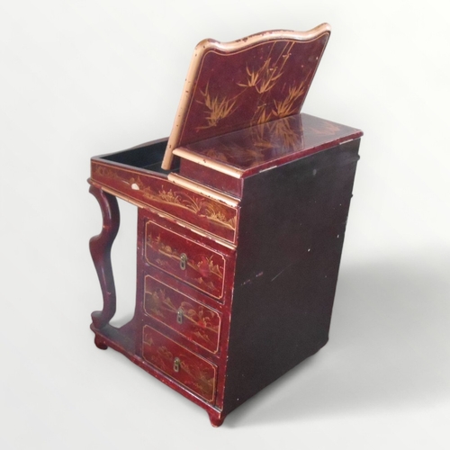 218 - Unusual lacquer finished davenport of typical form and construction having three side drawers opposi... 