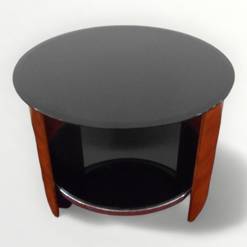 275 - 'Jual Curve' San Marino walnut veneered black glass two tier lamp table of retro/deco design model J... 