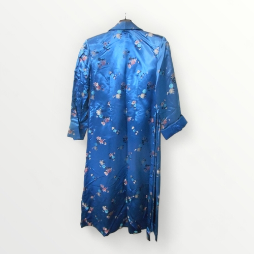 287 - Traditional embroidered blue silk kimono, labelled 38. Shipping group (A).