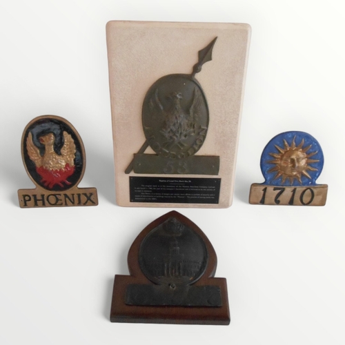 295 - Georgian cast lead fire insurance mark, mounted and three reproduction examples. Shipping group (B).