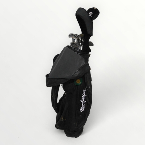 324 - MacGregor golf bag containing a selection of Wilson 2100-GE clubs.