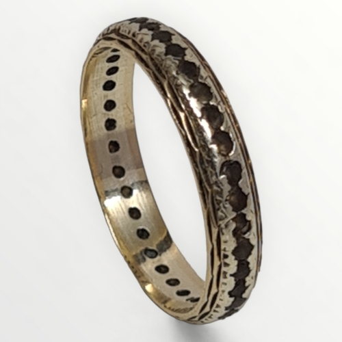 29 - 9ct eternity ring, 2.2g. Size P½. Shipping group (A).