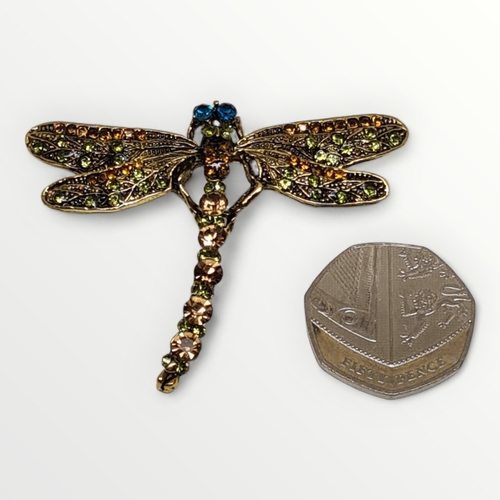 30 - Bejewelled yellow metal dragonfly brooch. Shipping group (A).