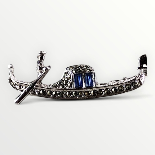 46 - Continental silver .835 marcasite and blue stone set brooch in the form of a Gondola. 5.8g. Shipping... 