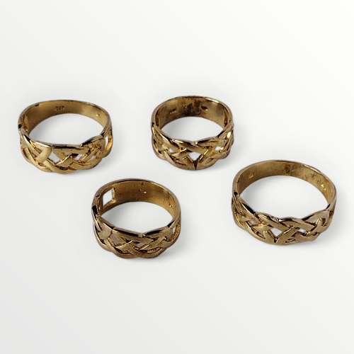 51 - Four .925 silver gilt rings, 15g. Shipping group (A).