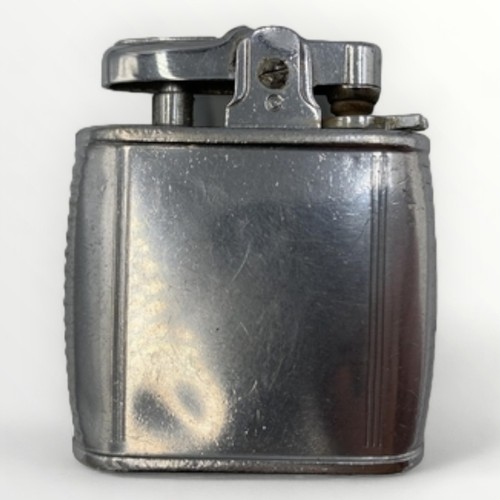 59 - Nine collectable vintage cigarette lighters; Ronson (8), Penguin (1). Shipping group (A).