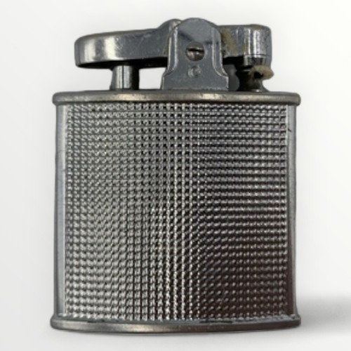 59 - Nine collectable vintage cigarette lighters; Ronson (8), Penguin (1). Shipping group (A).