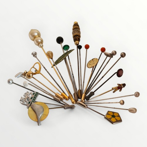 73 - A selection of hat/tie pins various. Shipping group (A).