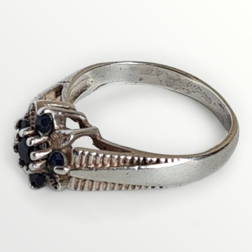 11 - Silver and sapphire set ring. Size N½. Shipping group (A).