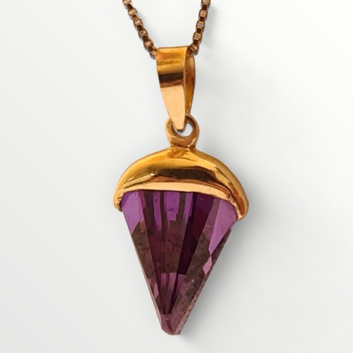 191 - Large amethyst pendant having 14ct yellow gold setting on chain. Shipping group (A).