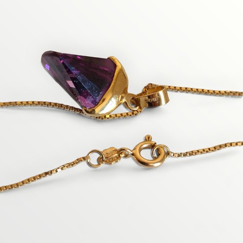 191 - Large amethyst pendant having 14ct yellow gold setting on chain. Shipping group (A).