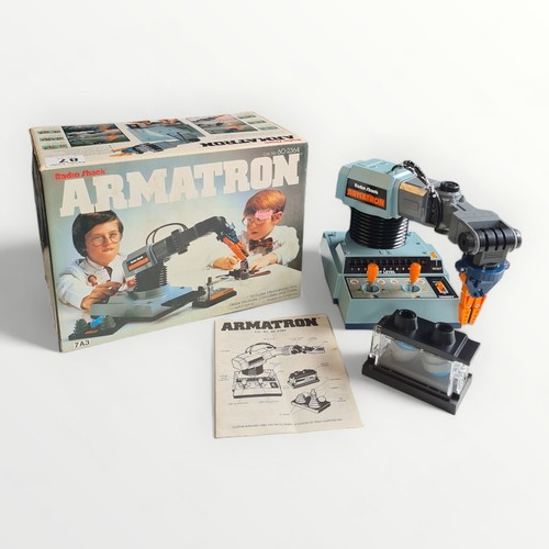 87 - An unused and boxed vintage 'Radio Shack' Armatron - remote control robot arm. Shipping group (A).