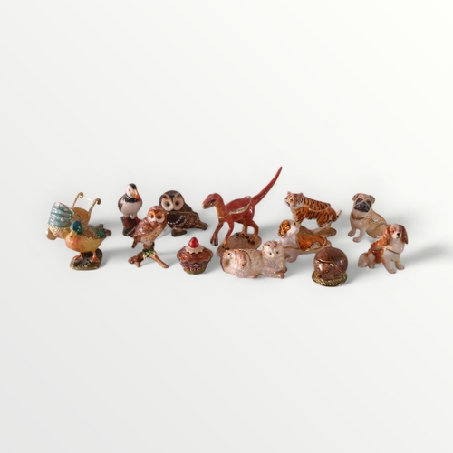 100 - A good selection of enamelled 'Hidden Treasures' figures to include a 'Velociraptor' 9cm high. Shipp... 