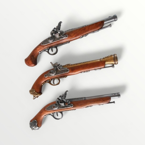 108 - Three reproduction flint lock pistols, 40cm longest. Shipping group (A).