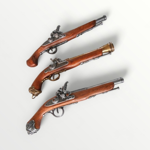 108 - Three reproduction flint lock pistols, 40cm longest. Shipping group (A).