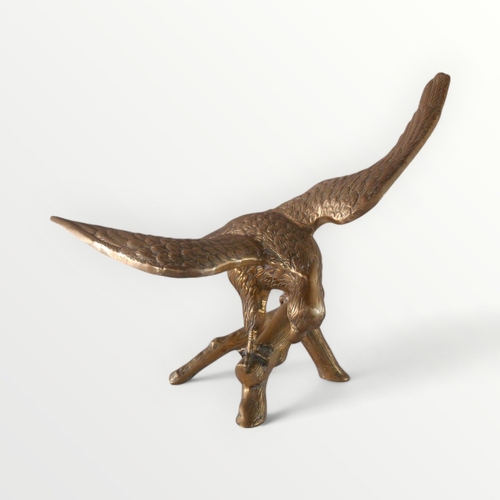 90 - Large cast brass model of an Eagle on a branch, 65cm wing tip to tip.