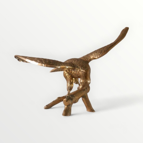 90 - Large cast brass model of an Eagle on a branch, 65cm wing tip to tip.