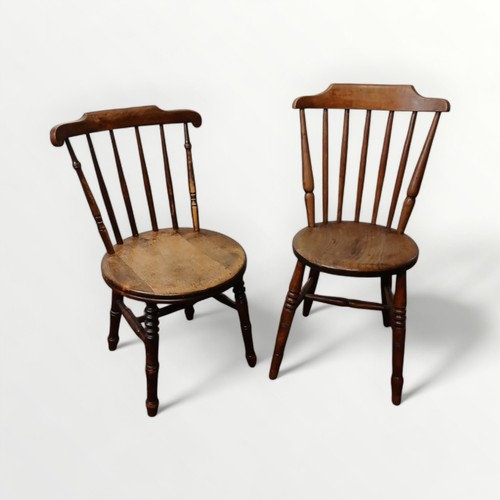 154 - Two 19th century stick back 'penny seated' single chairs.  84cm tallest.