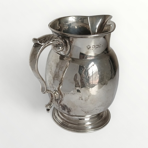 5 - Silver jug, hallmark for Sheffield, 201g. Shipping group (A).