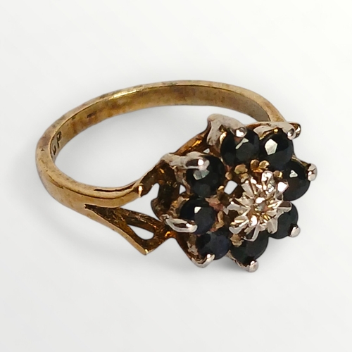 6 - Gold on silver white stone and garnet halo ring,, size K. Shipping group (A).