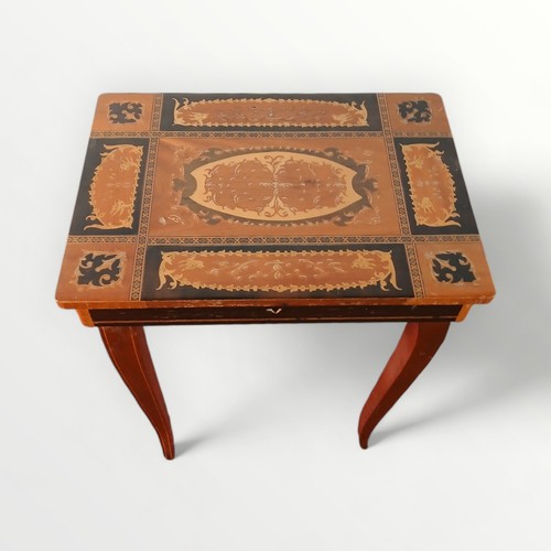 157 - Small Italian musical table having storage interior. 43 x 37 x 27cm.