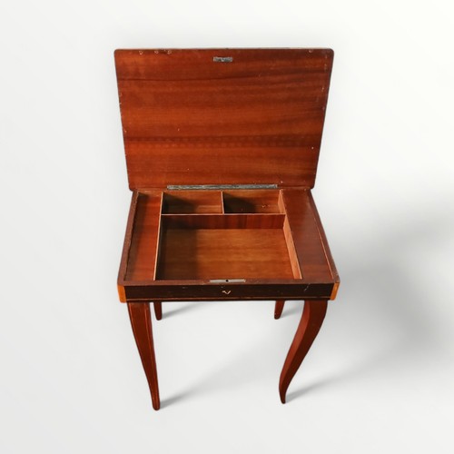 157 - Small Italian musical table having storage interior. 43 x 37 x 27cm.