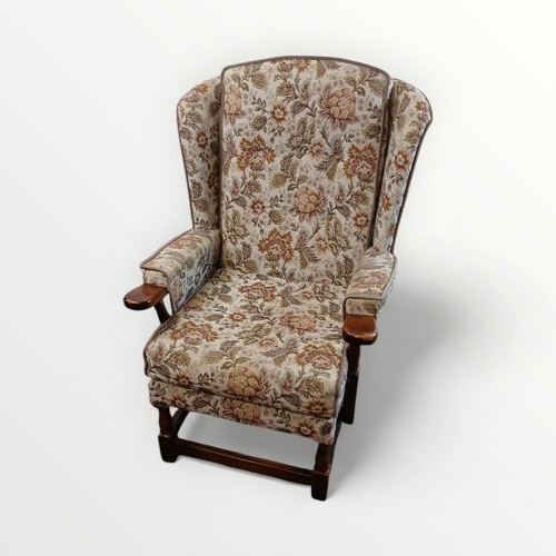 158 - Floral upholstered show wood framed 'fire side' easy chair. 44cm to seat 96cm overall.