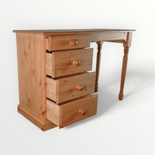 184 - Modern pine desk with a bank of four drawers, 72 x 105 x 44cm.